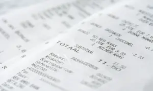 Paragon z zakupami, gdzie numer paragonu jest widoczny. Widoczne pozycje: "TOTAAL", "SUBTOTAAL", "MILNER KAAS", "CHOCOMEL".