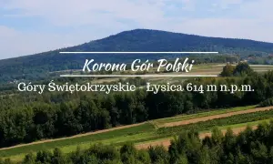 Łysica, najwyższy szczyt Gór Świętokrzyskich, wznosi się majestatycznie na tle błękitnego nieba.