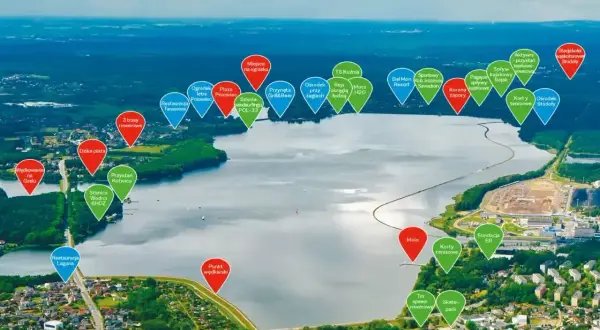 Widok na jezioro rybnickie z zaznaczonymi atrakcjami: plażą, restauracjami, trasami rowerowymi i sportami wodnymi.