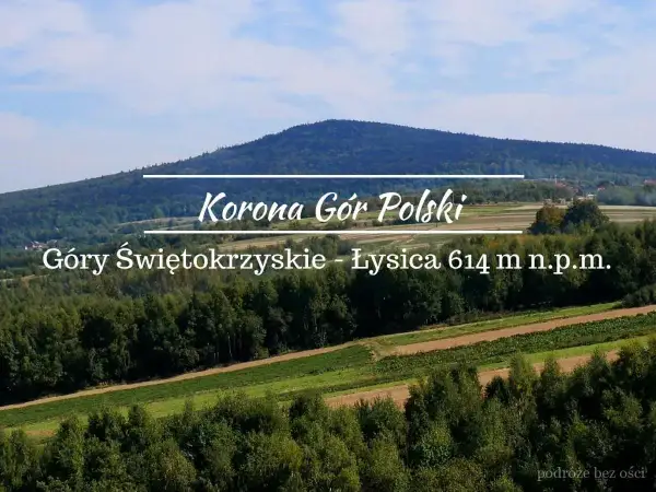Łysica, najwyższy szczyt Gór Świętokrzyskich, wznosi się majestatycznie na tle błękitnego nieba.